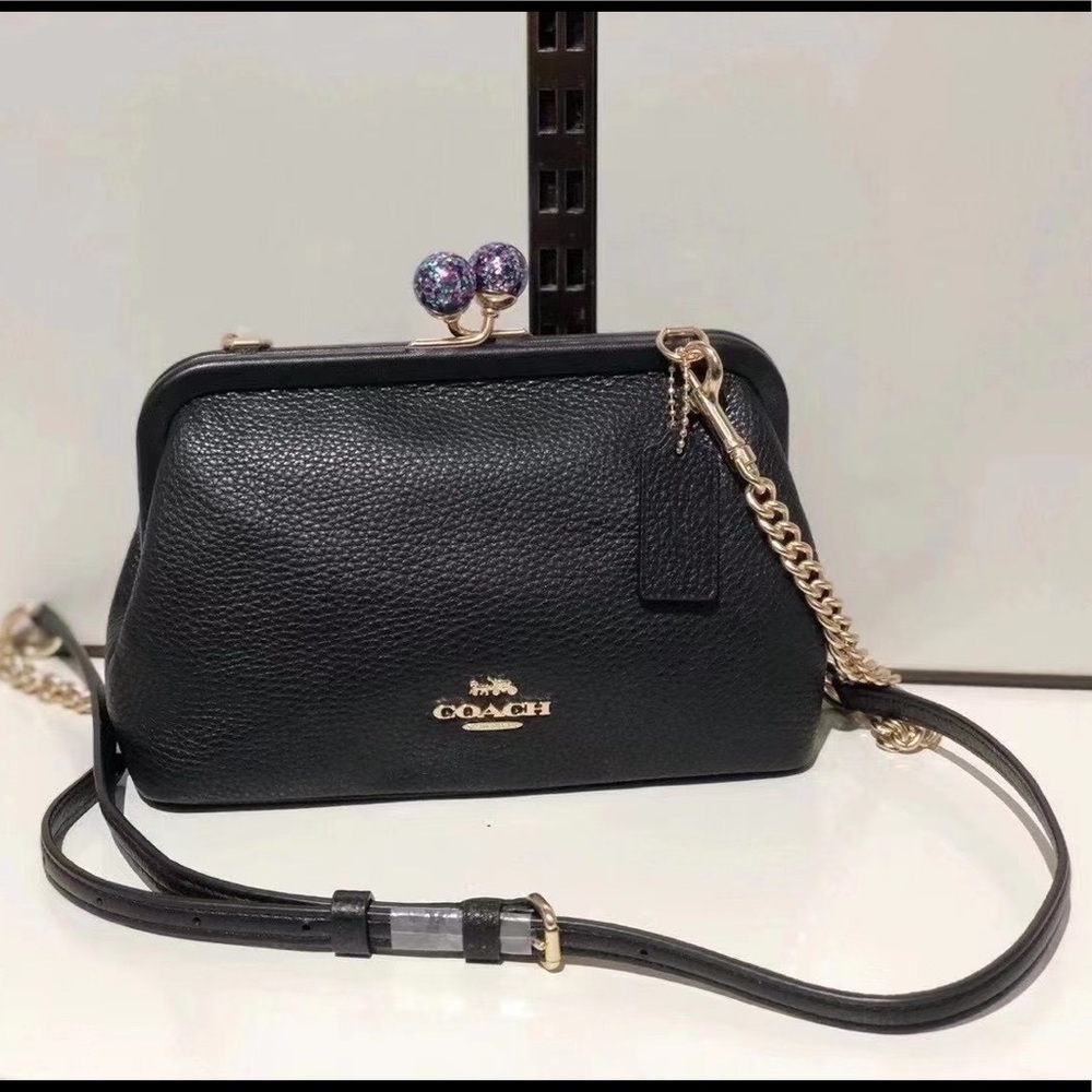 NWT Coach  Nora Kisslock Crossbody Bag .